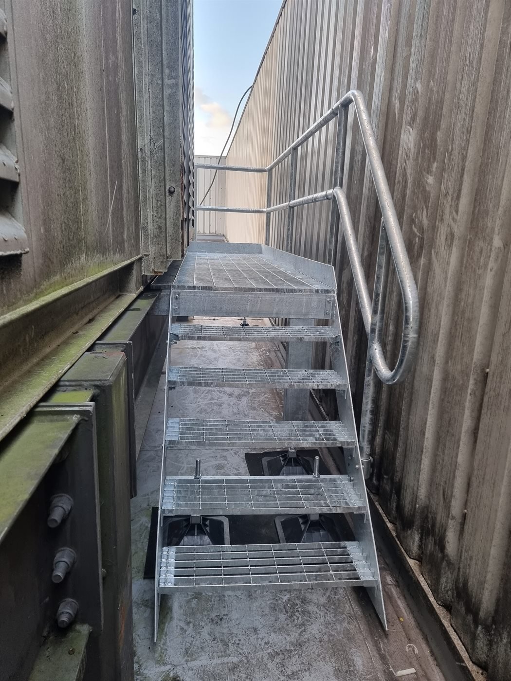 Galvanised steel handrail fitted on a commercial ramp